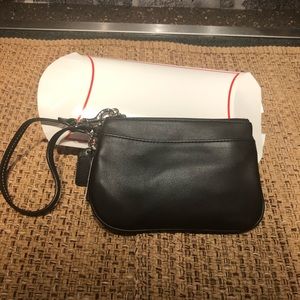 Black leather Coach wristlet. NWT